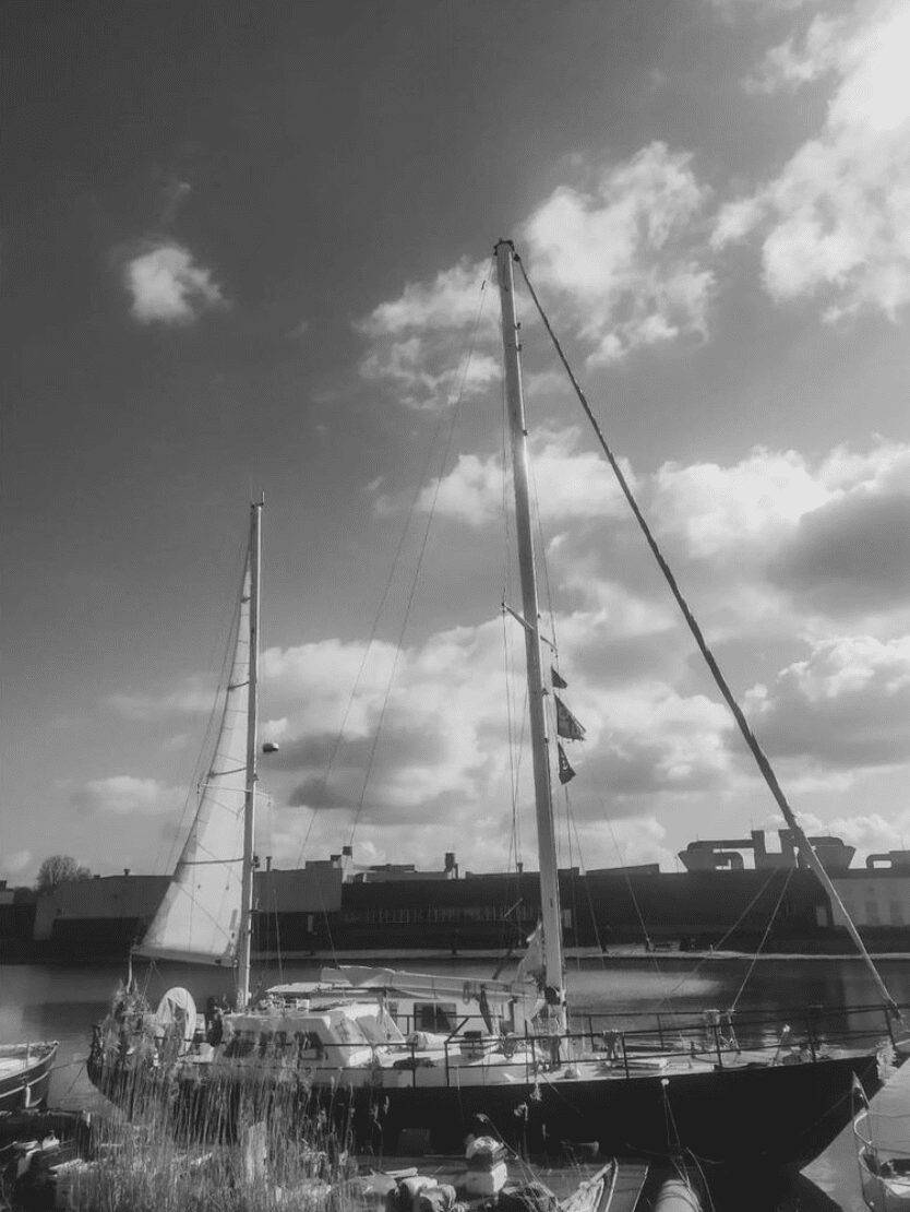 a black and white photo showcasing an offshore sailing adventure in the Atlantic.